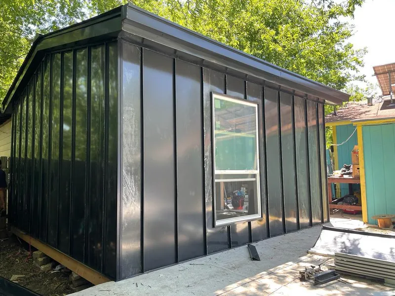 Black standing seam metal wall panels for Roof Inspection in Murrieta